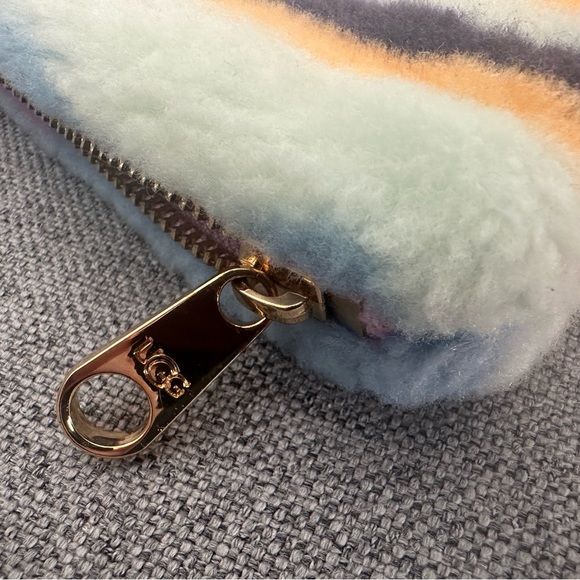 UGG Handbags - Small Pouch like new comes from smoke and pet free home! Super cute!